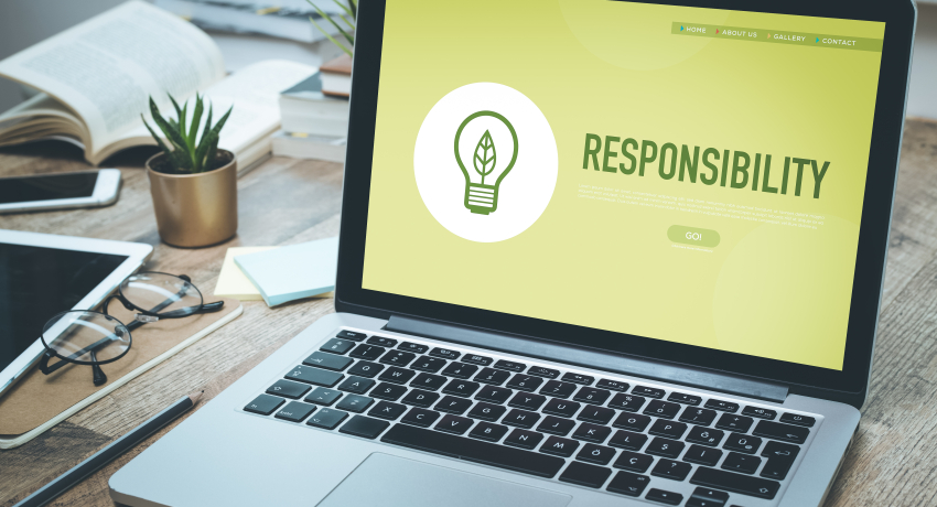 Laptop mit "Responsibility" auf dem Bildschirm