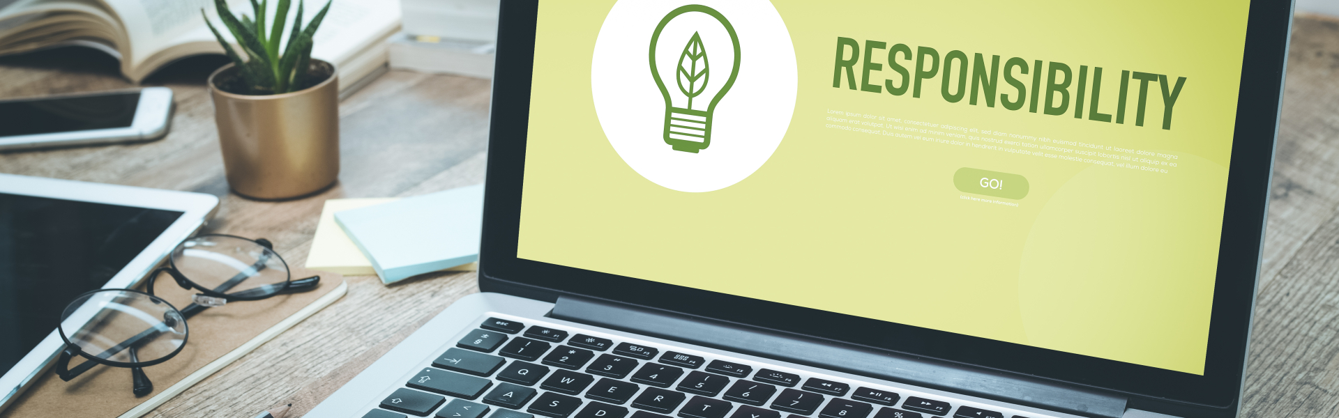 Laptop mit "Responsibility" auf dem Bildschirm